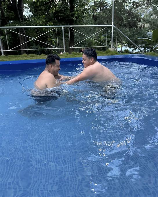 Two men in a pool