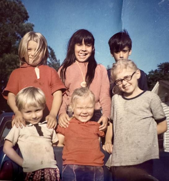 A group of children posing for a photo