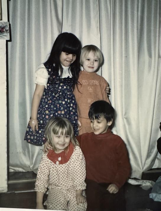 A group of children posing for a photo