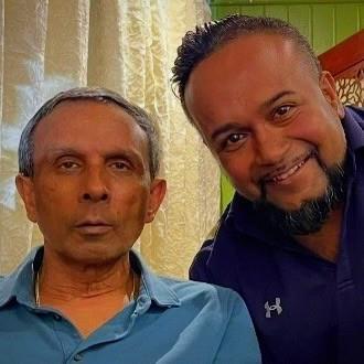 Two men posing for a picture
