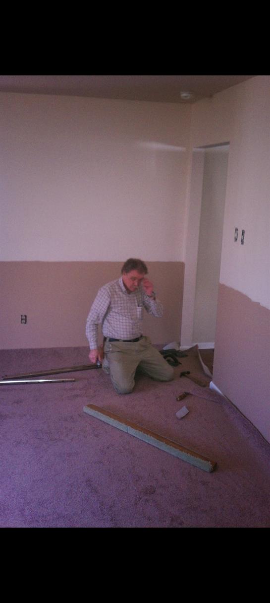 A man sitting on the floor