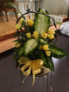 A yellow flowers in a basket