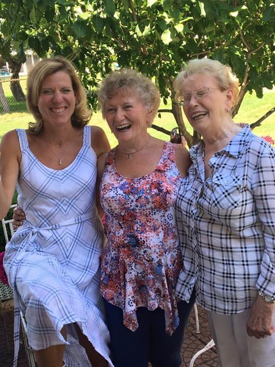 A group of women posing for a picture