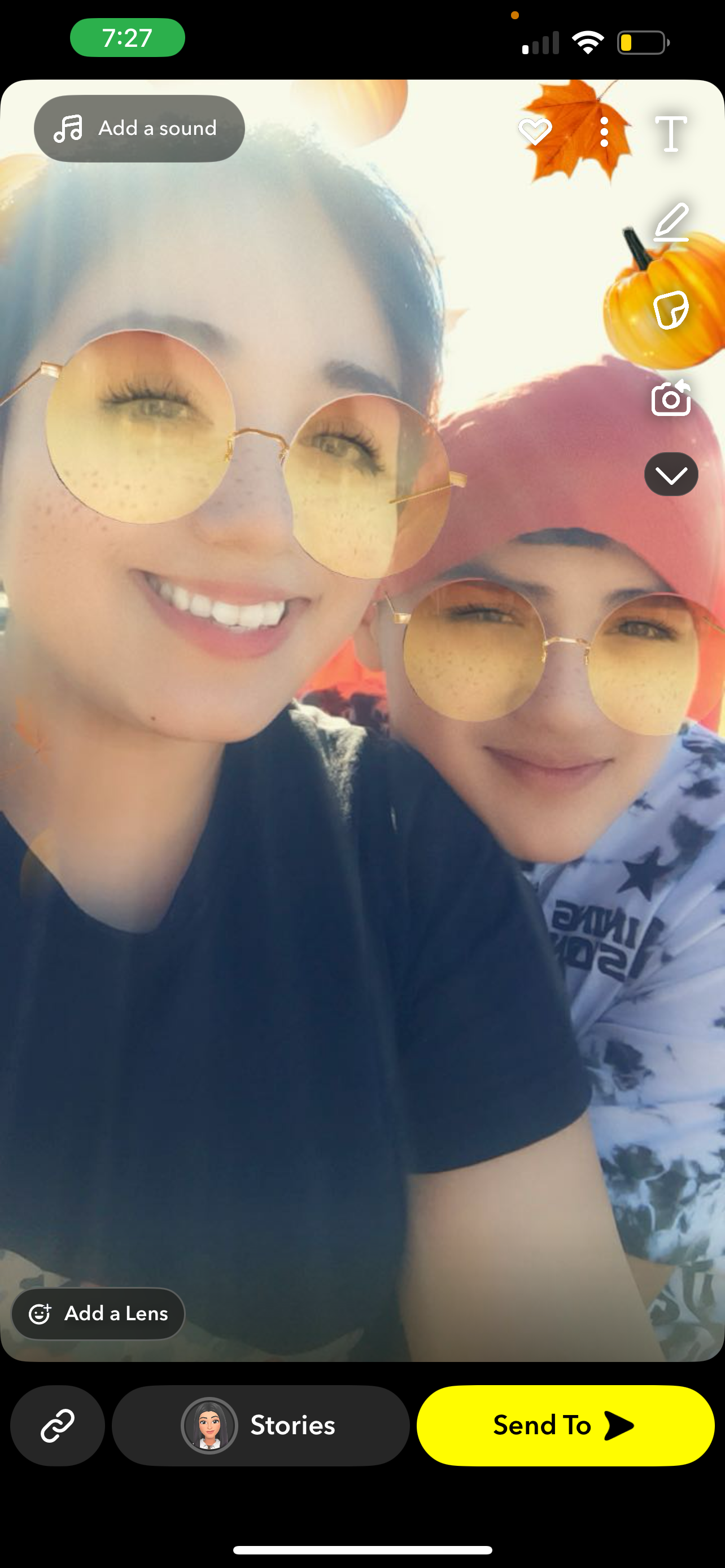 Friends relax and smile together under the sun, enjoying a day at the beach filled with joy.