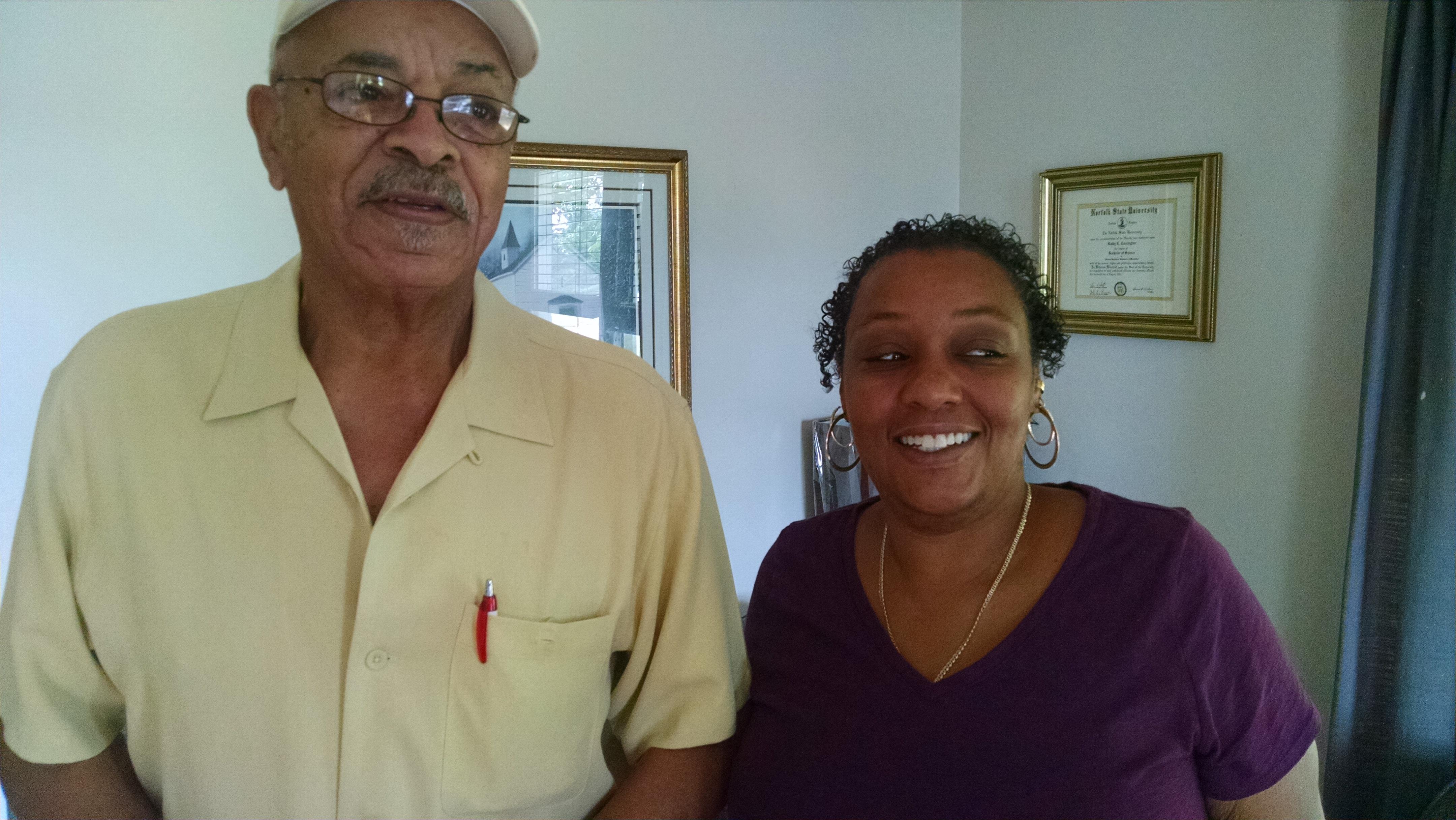 A man and woman smiling for a picture
