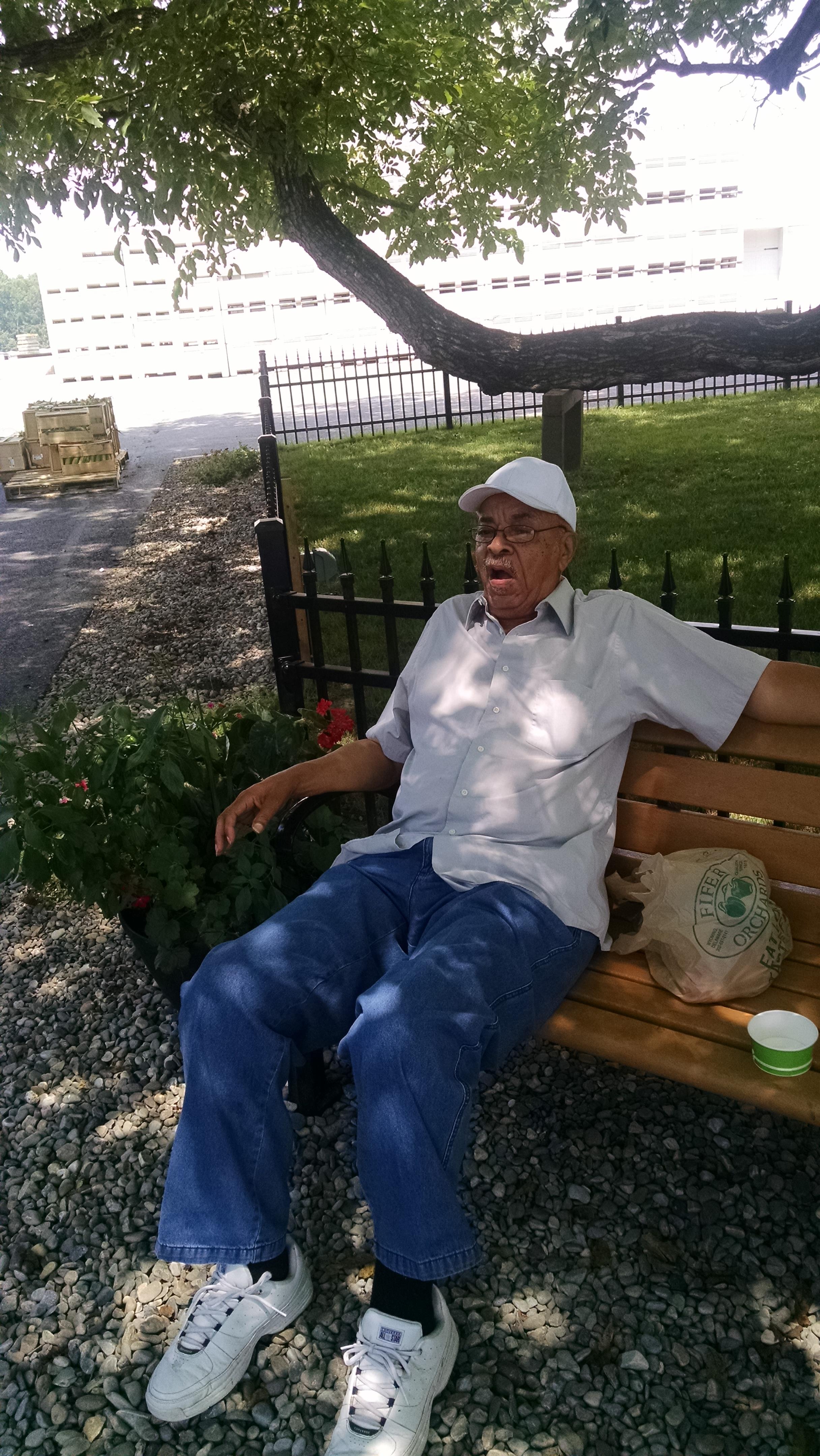 A man sitting on a bench