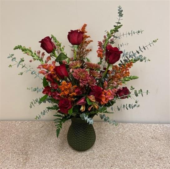 A vase with flowers in it