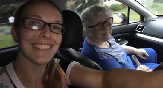 A woman and an older woman in a car