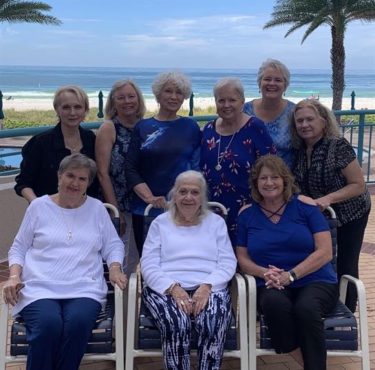A group of women posing for a photo