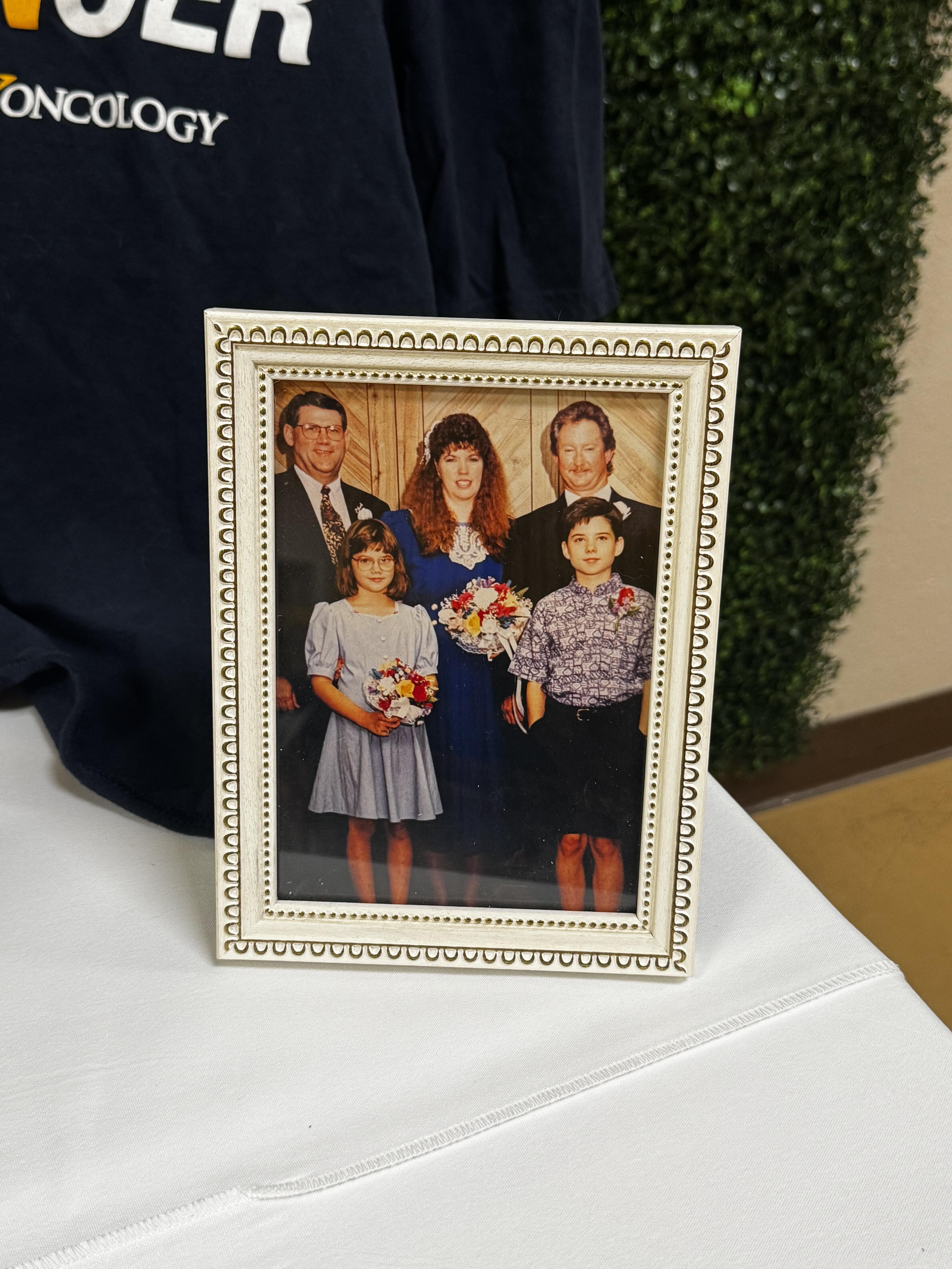 A family photo in a frame