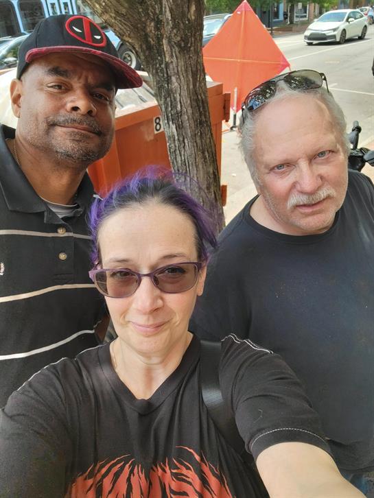 A group of people taking a selfie