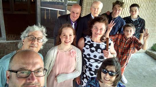 A group of people posing for a photo
