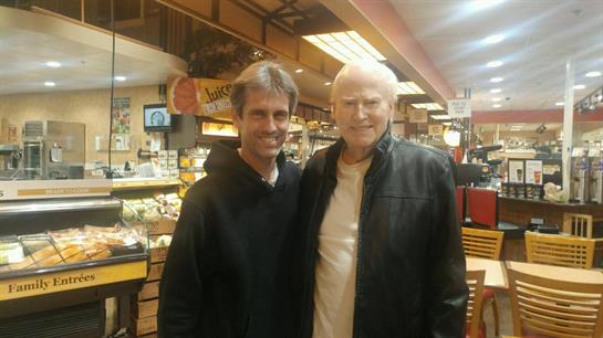 Two men standing together in a store