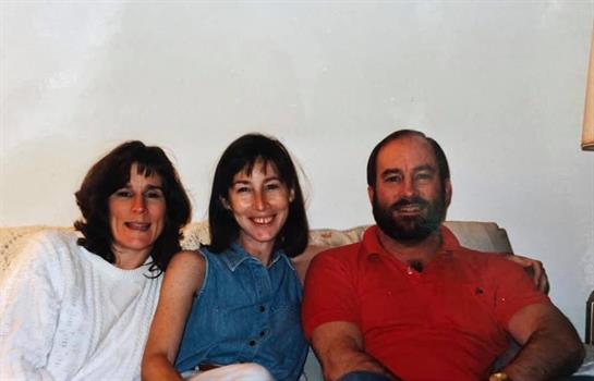 A group of people sitting on a couch