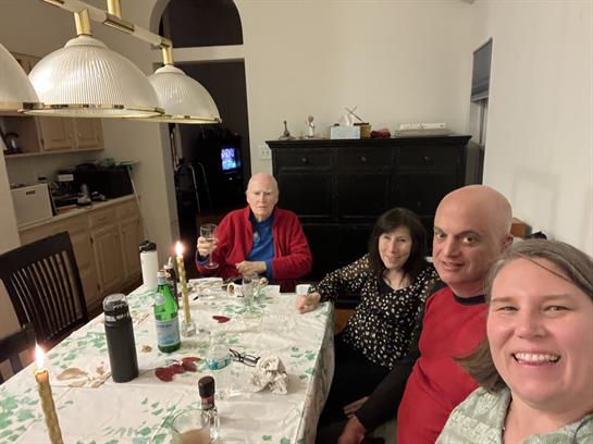 A group of people sitting at a table