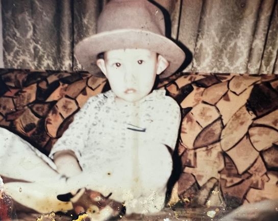 A child sitting on a couch