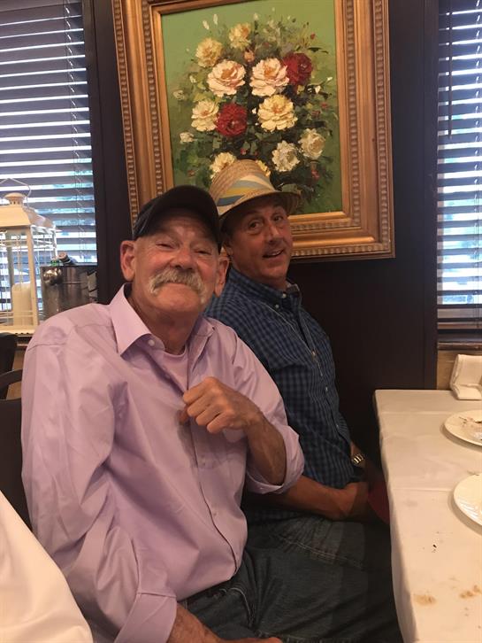 Two men sitting at a table