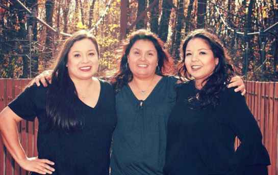 A group of women posing for a picture