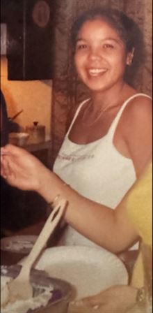 A woman smiling at camera
