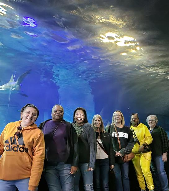 A group of people standing in a tunnel