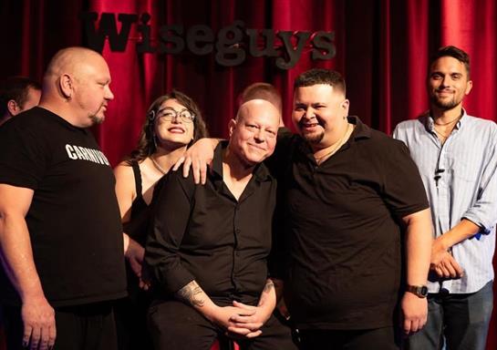 A group of people posing for a photo
