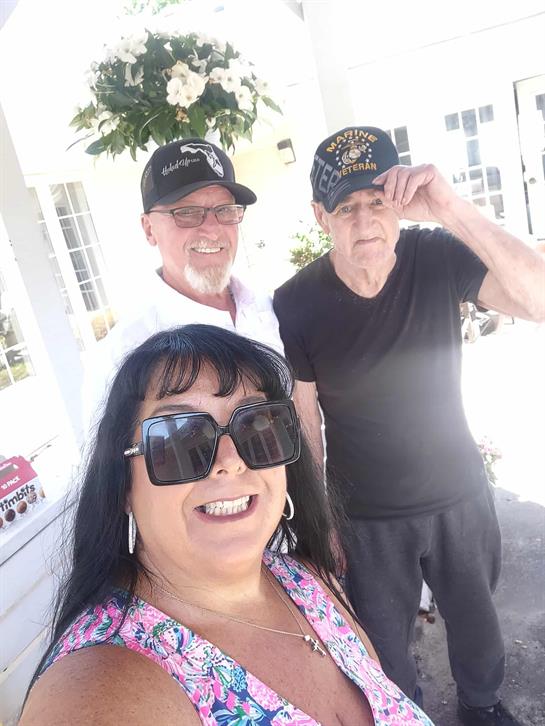 A group of people posing for a selfie