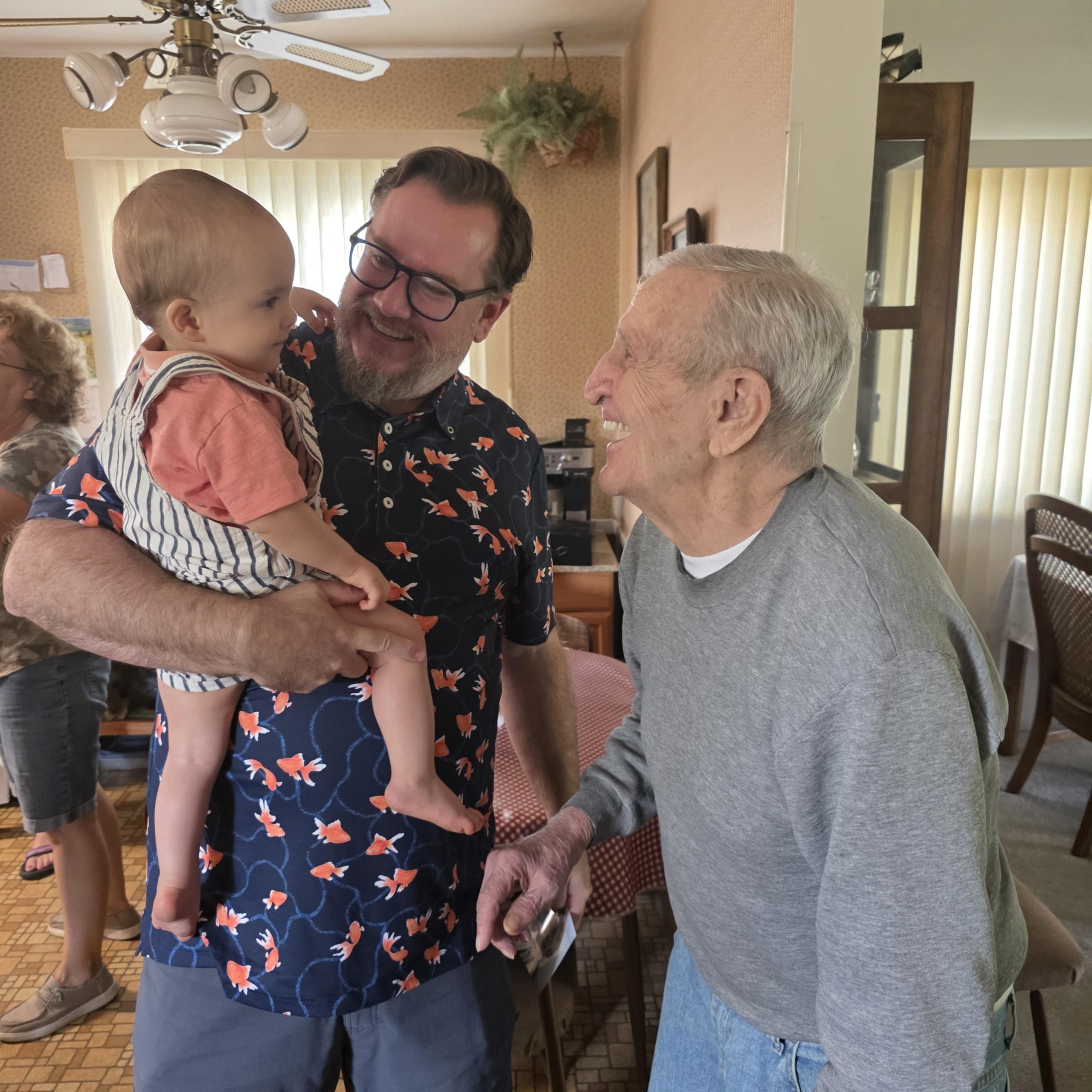 A man holding a baby