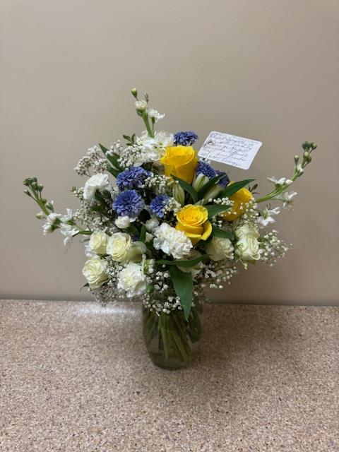 A vase of flowers on a table