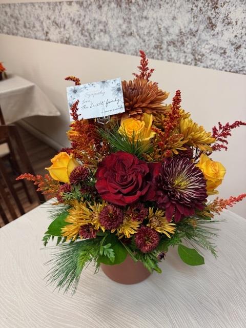 A bouquet of flowers on a table