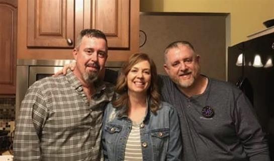 A group of people posing for a photo