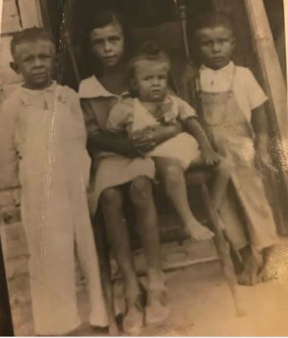 A group of children posing for a photo