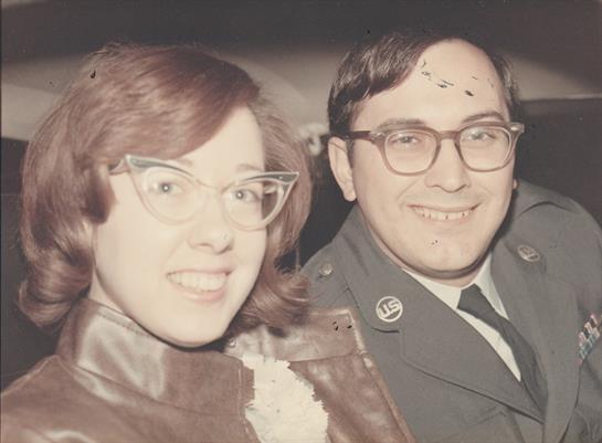 A man and woman smiling for a picture