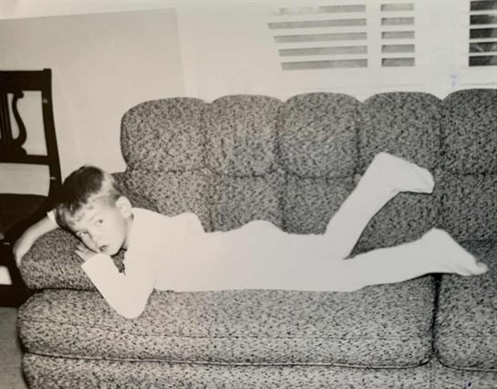 A child lying on a couch