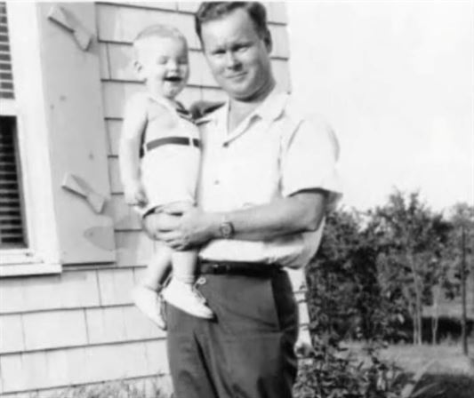 A man holding a baby