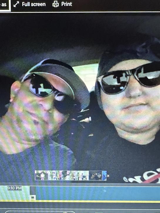 A couple of men wearing sunglasses