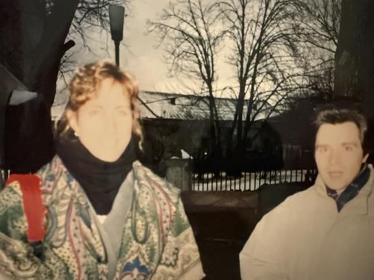 A group of people standing outside