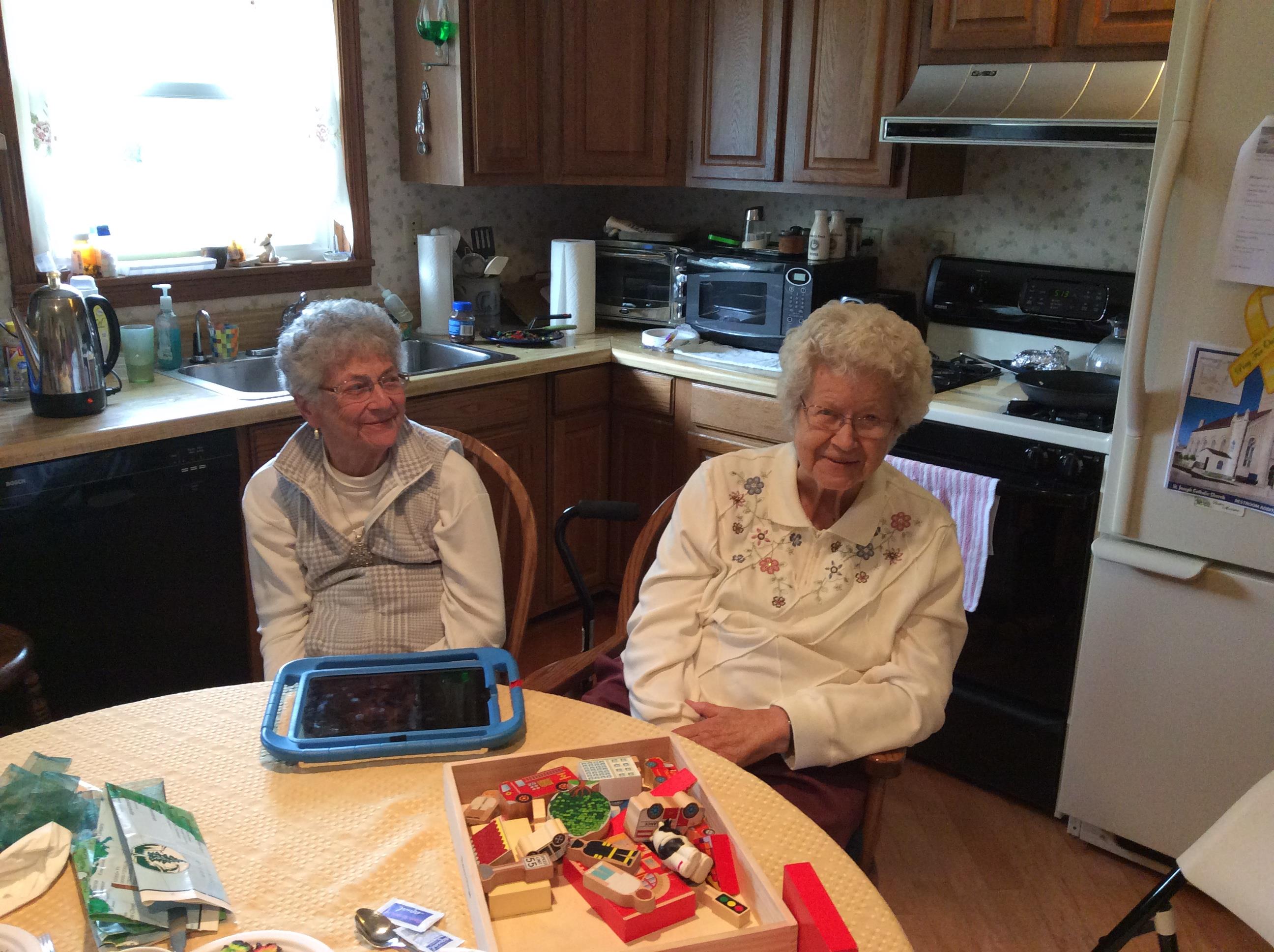 Two women sitting at a table