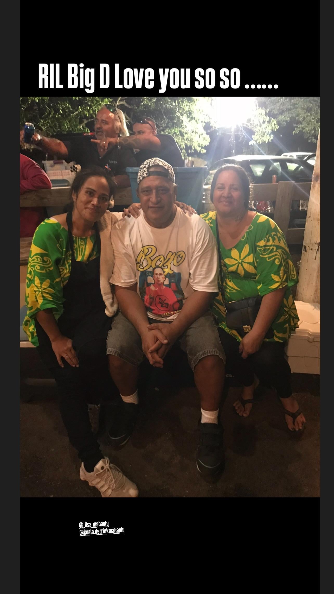 Three friends sit together in colorful outfits during a fun evening gathering in a public space.
