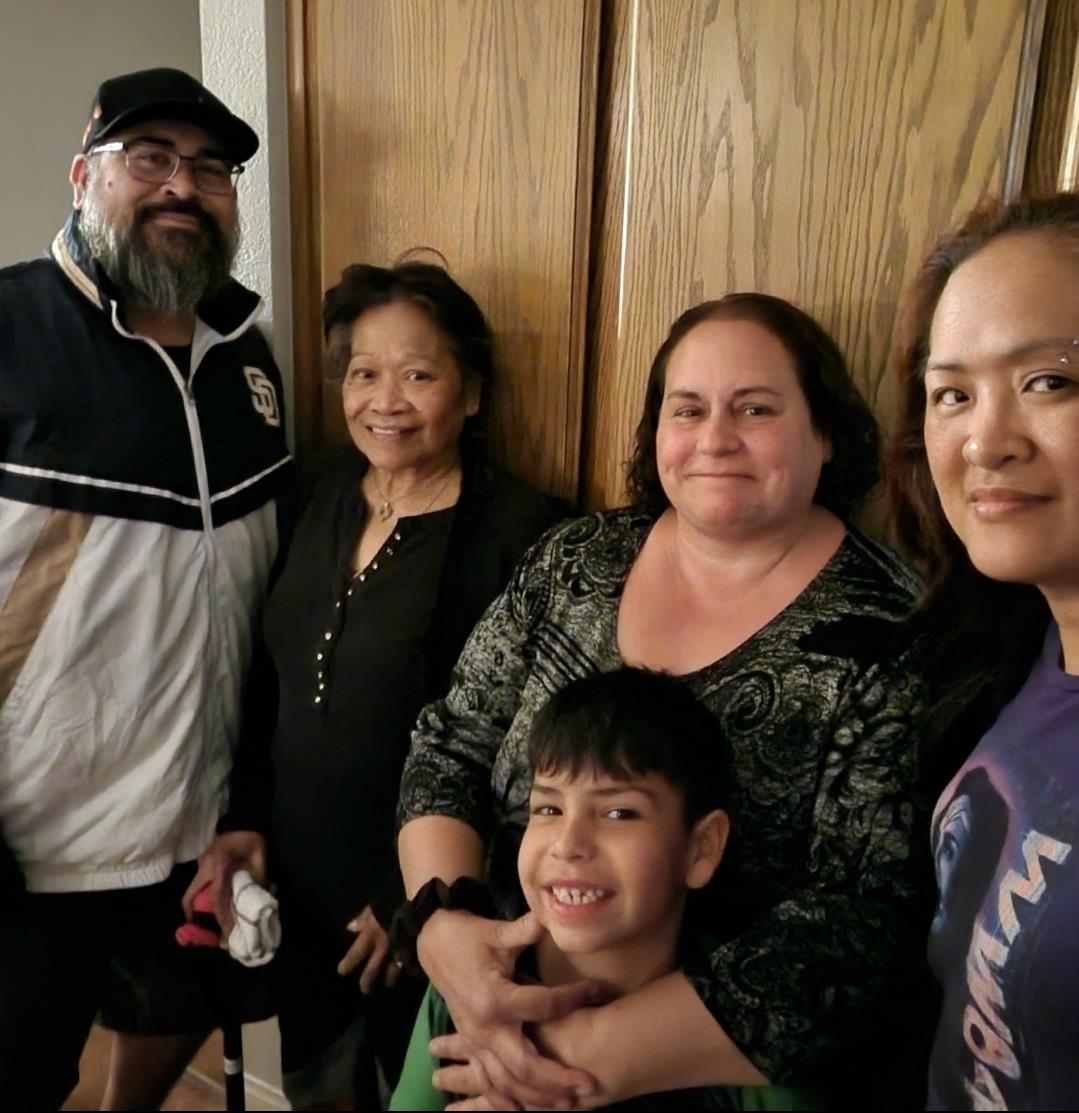 A group of people posing for a photo