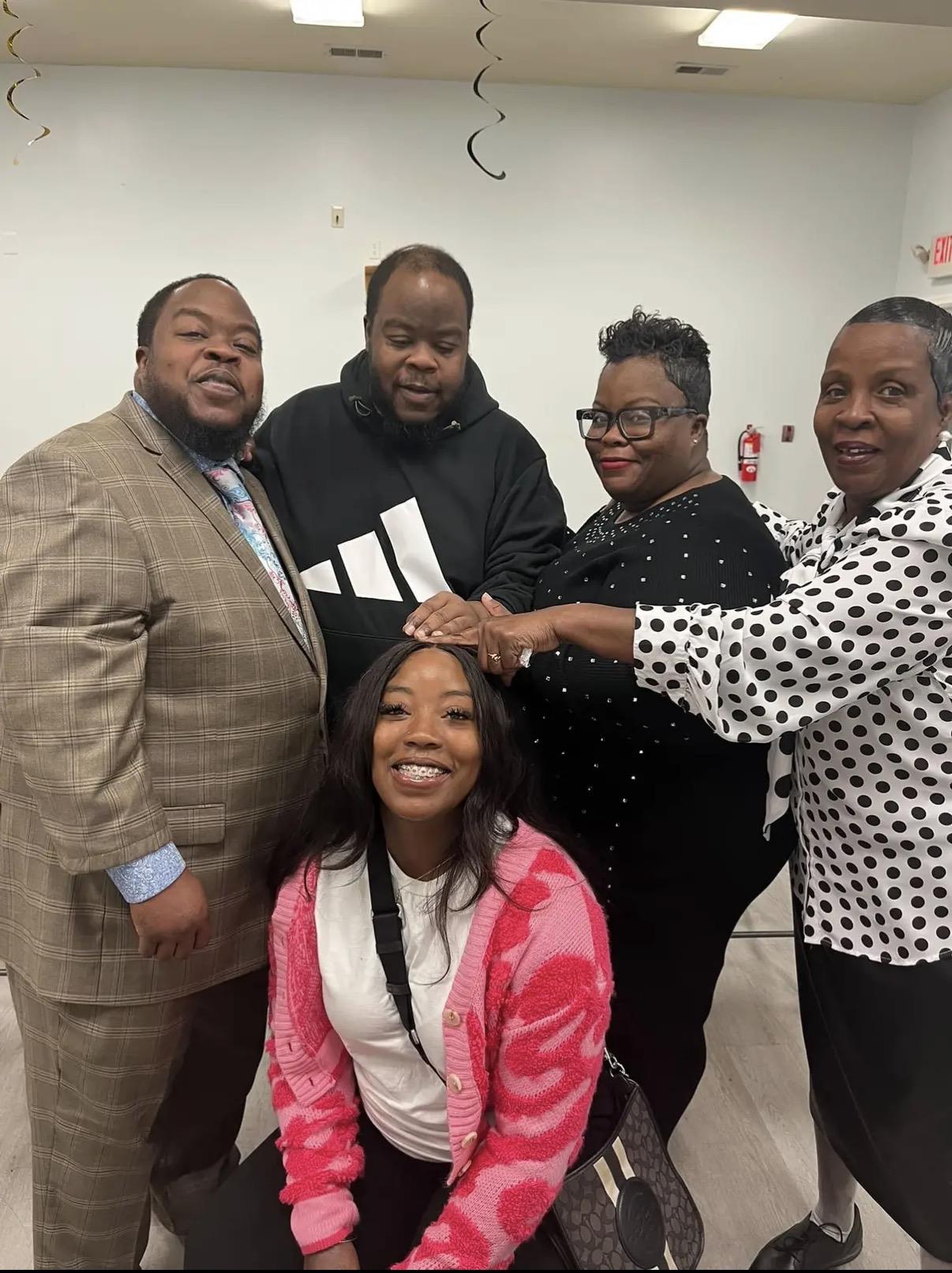 A group of people posing for a photo