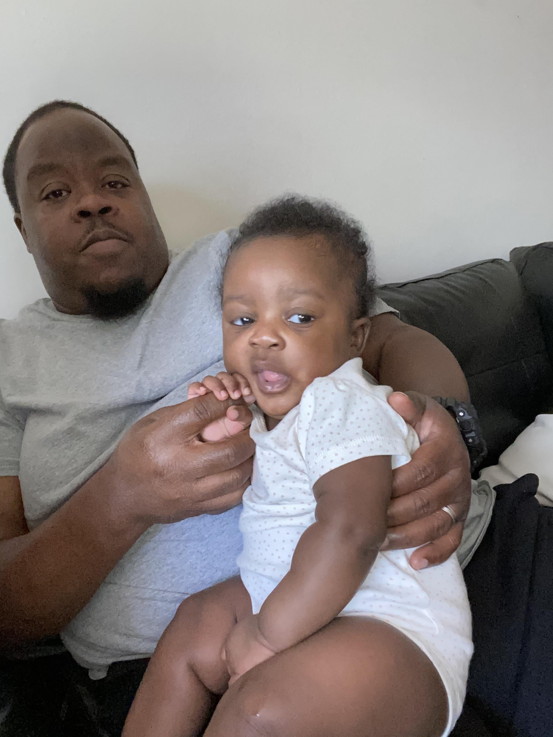 A man holding a baby