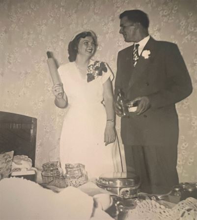 A man and woman standing next to each other