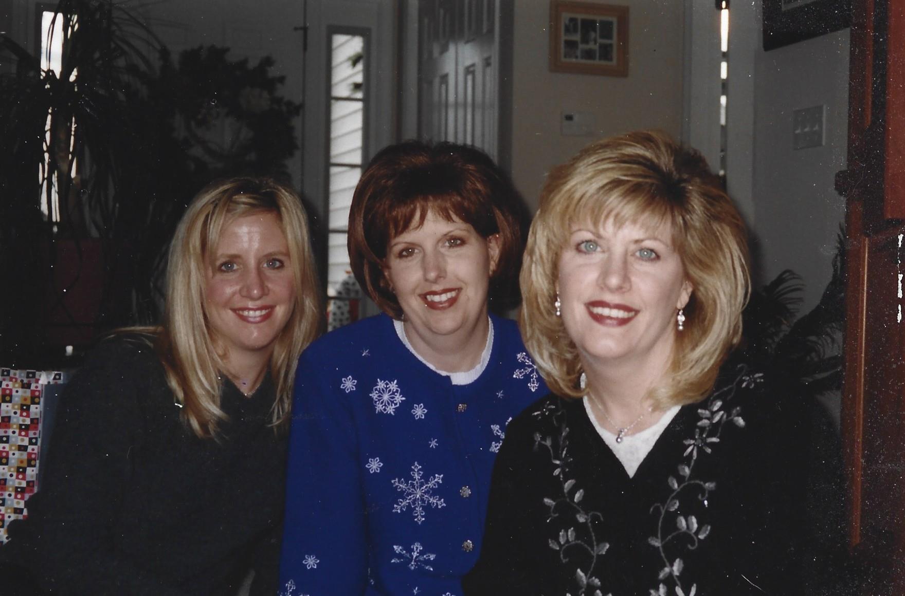 A group of women smiling for a photo