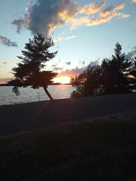A sunset over a lake