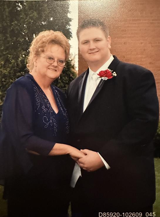 A man and woman posing for a picture