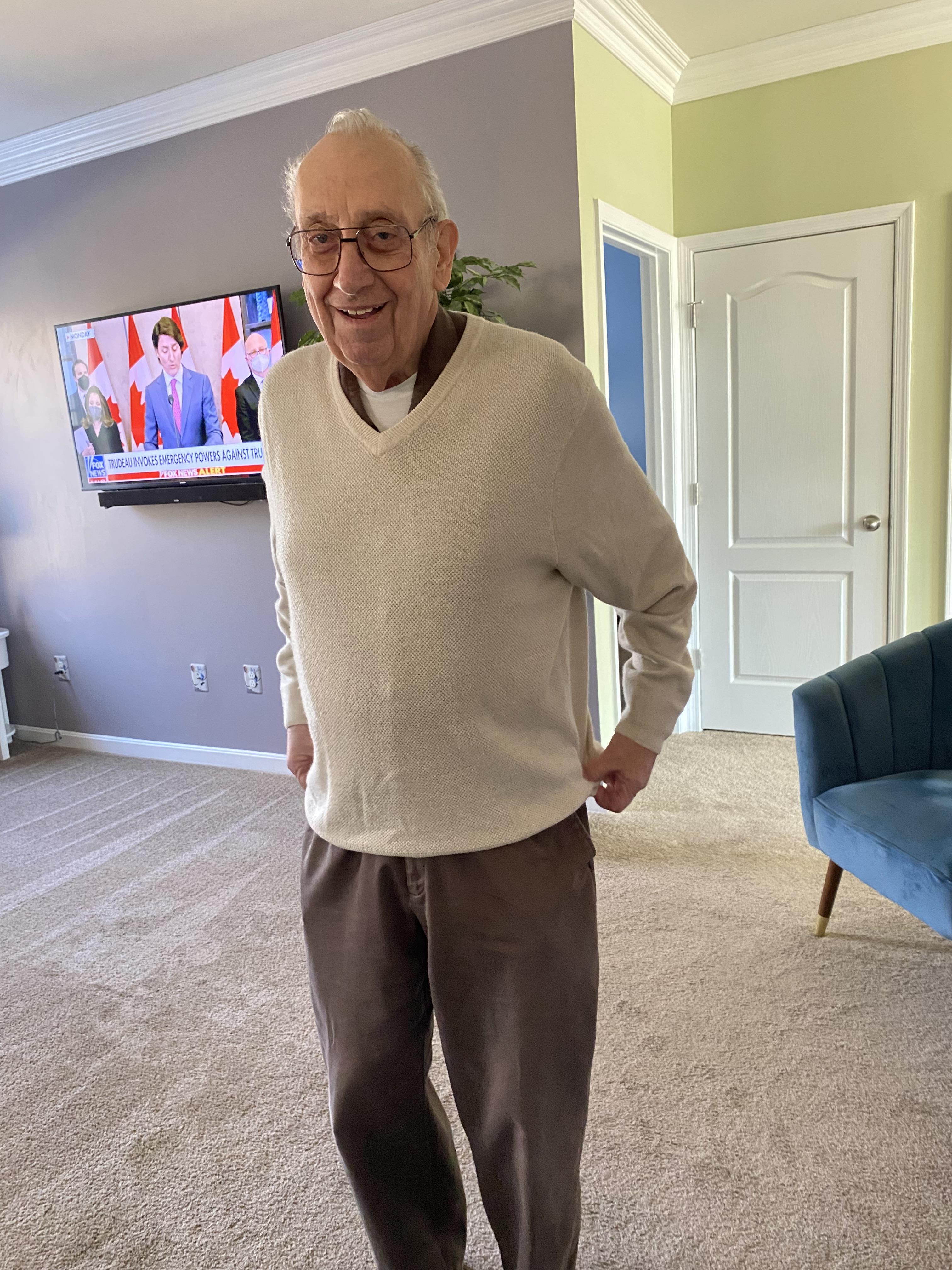 An old man in a living room