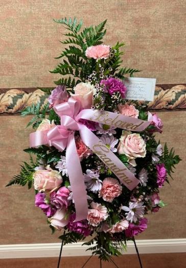 A bouquet of flowers with a ribbon