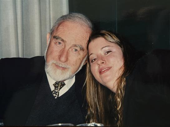 A man and woman posing for a picture