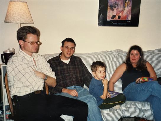 A group of people sitting on a couch
