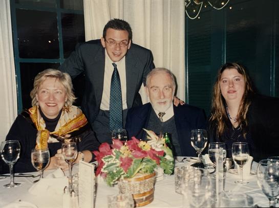 A group of people sitting at a table